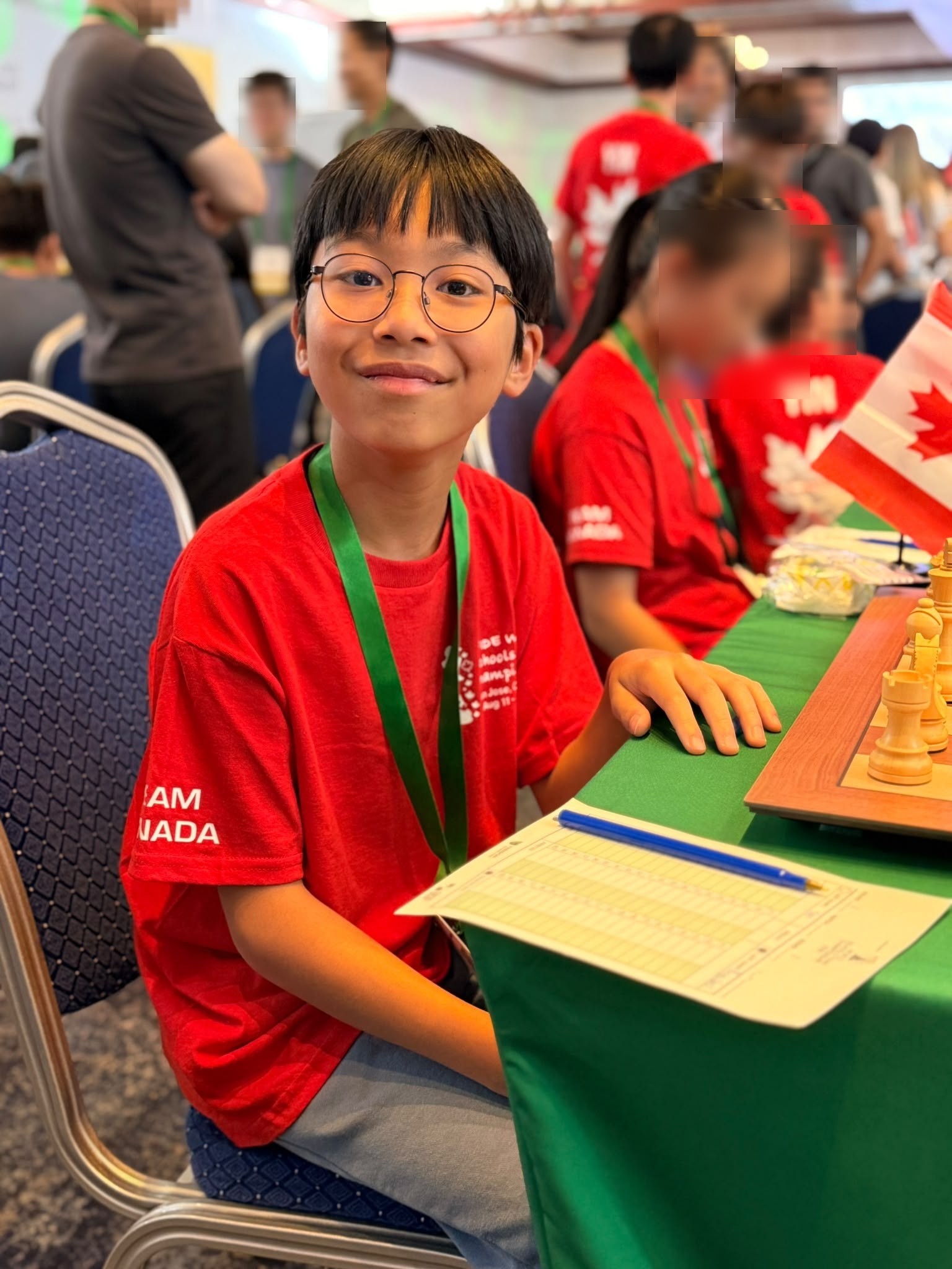 Lucas Yao in Team Canada colours at the board in Costa Rica