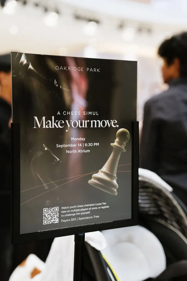 Oakridge Park event sign reading A Chess Simul, Make your move