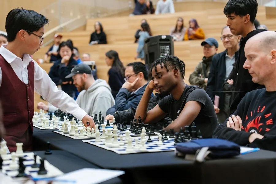 Lucas Yao making a move during the twenty-board simultaneous exhibition at Oakridge Park