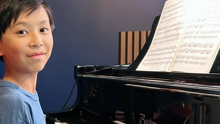 Lucas Yao at the piano, from Sing Tao Daily’s profile